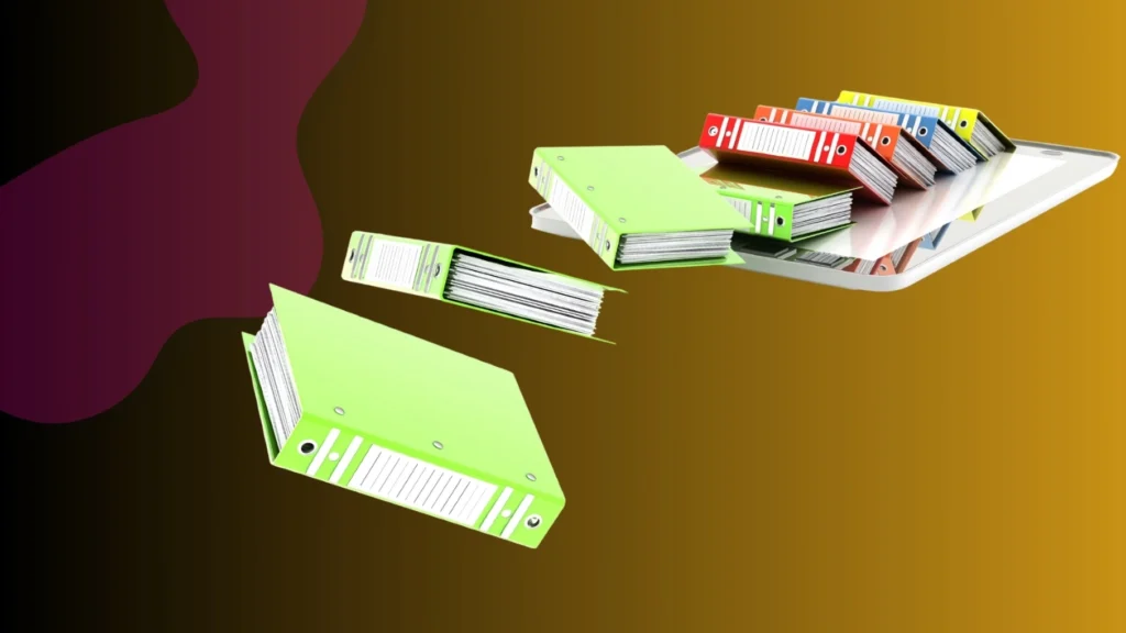 Rozsypane segregatory z dokumentacją techniczną jako symbol pracy nad instrukcjami obsługi